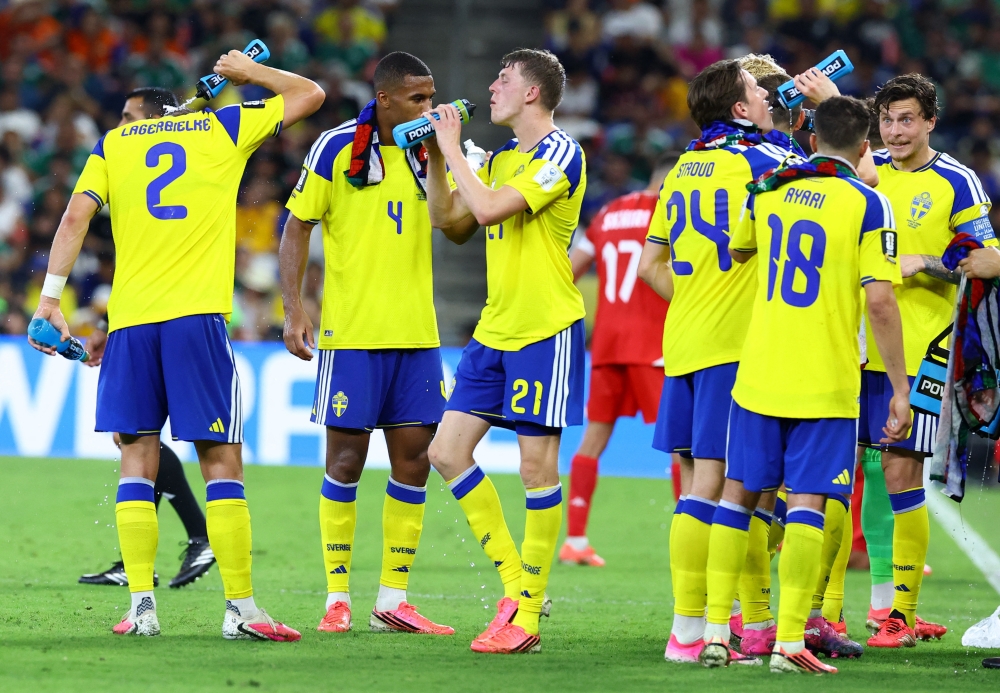 Commercials over football? Why are hydration breaks turning the World Cup into an American show?