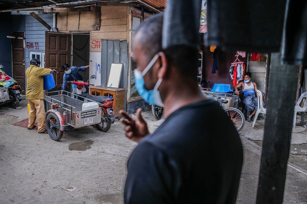 People are seen at a Rohingya settlement in Kuala Lumpur on June 13, 2021. — Picture by Hari Anggara