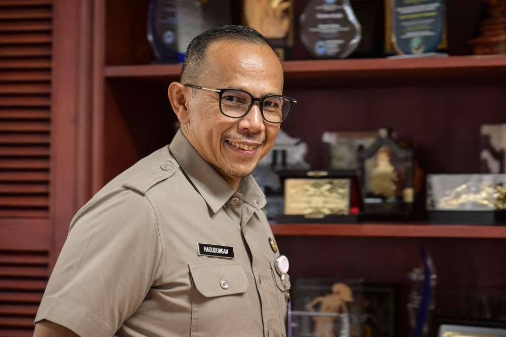 Hasudungan A. Sidabalok, head of Jakarta's food resiliency, maritime and agriculture agency (DKPKP), posing during an interview with AFP in Jakarta. — AFP pic