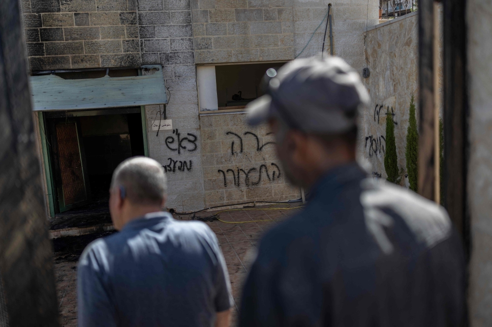 West Bank mosque set ablaze amid surge in Israeli settler violence
