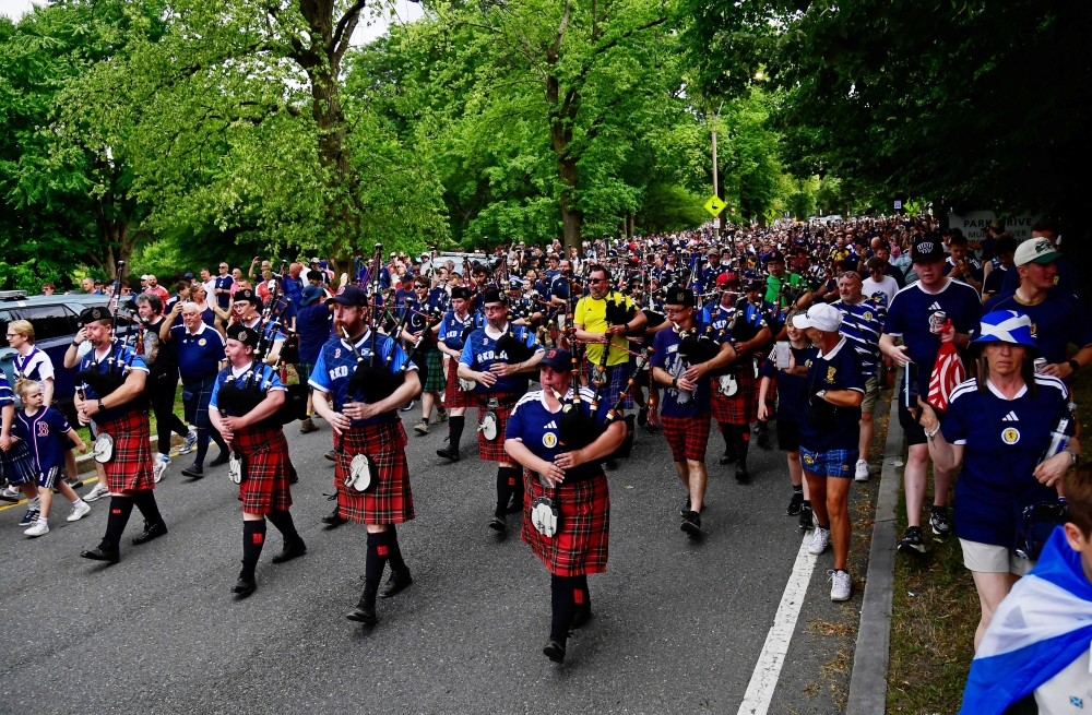 ‘They’re great, great people’: Tartan Army takes over Boston as Scotland fans revel in World Cup return and drink bars dry (VIDEO)