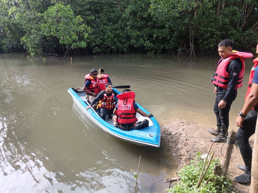 Labuan rescue teams recover missing eight-year-old’s body from Sungai Ganggarak Permai, 50m from where slippers dropped