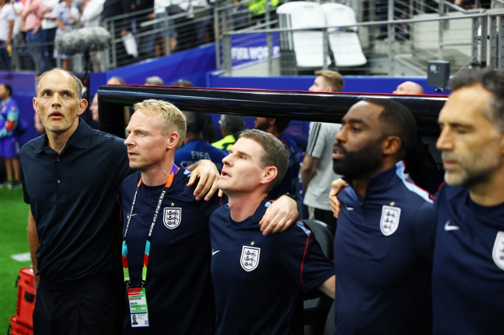 England manager Thomas Tuchel and his coaching during the national anthems before the Fifa World Cup 2026 Group L match between England and Croatia at Dallas Stadium, Arlington, Texas, June 17, 2026. — Reuters pic 