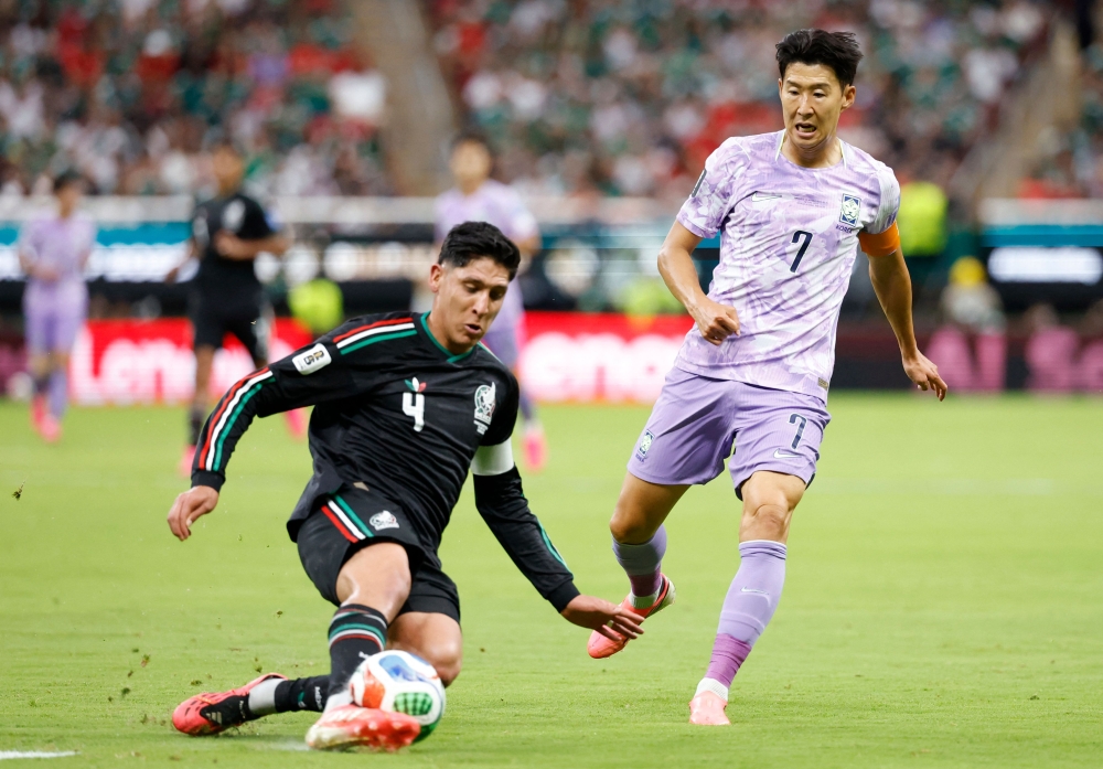 Mexico’s midfielder #04 Edson Alvarez and South Korea’s forward #07 Son Heung-min fight for the ball during the 2026 World Cup Group A football match between Mexico and South Korea at the Guadalajara Stadium in Zapopan June 18, 2026. — AFP pic