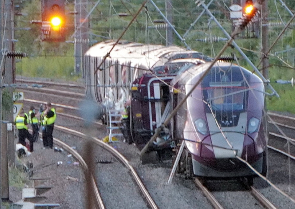 ‘Huge bang’ as two trains crash north of London, killing one passenger