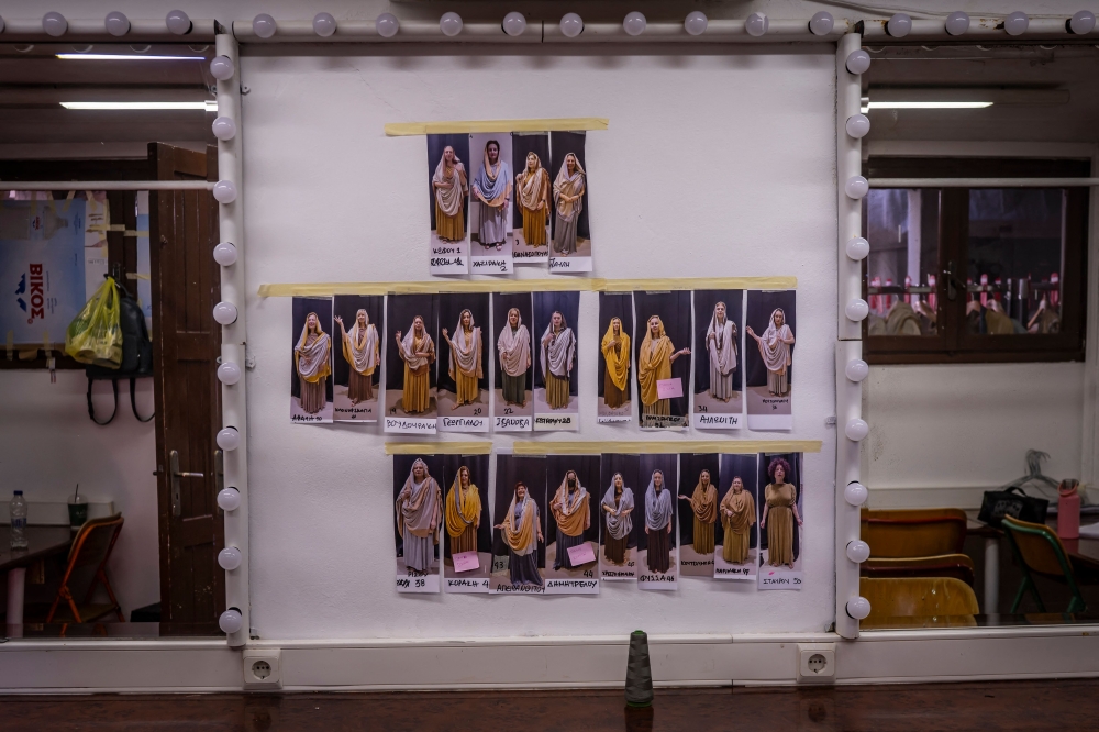 Pictures with costumes of the opera 'Medea' are displayed backstage at the Ancient Greek theatre of former city Epidaurus, in Nea Epidavros on June 18, 2026. With flamboyant costumes reminiscent of those from 1961, and a production reconstructed using notebooks and photographs from the period: 'Medea', the opera that brought Maria Callas her triumph, is being revived at the ancient Greek theatre of Epidaurus. During a one-off, sold-out performance on Saturday evening, the Greek National Opera returns for the first time in 65 years to this 4th-century BC amphitheatre, 200 kilometres from Athens, renowned for its exceptional acoustics. — AFP pic