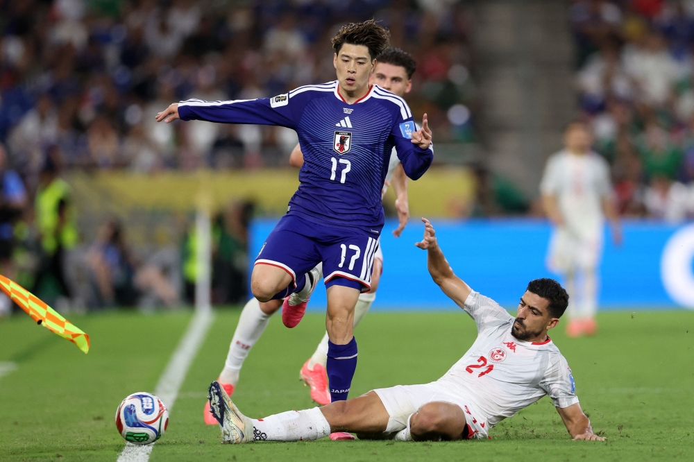 Japan stroll to victory over Tunisia in World Cup's 1,000th game