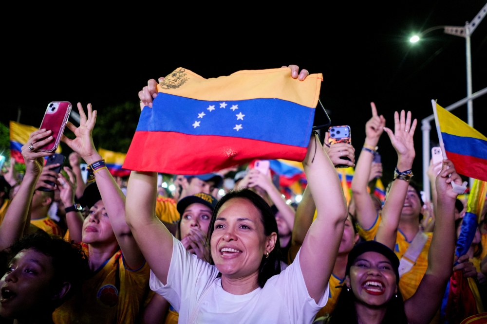 Supporters of Colombia’s right-wing presidential candidate Abelardo De La Espriella react after the preliminary runoff results against leftist candidate Ivan Cepeda, in Barranquilla, Colombia, June 21, 2026. — Reuters pic 