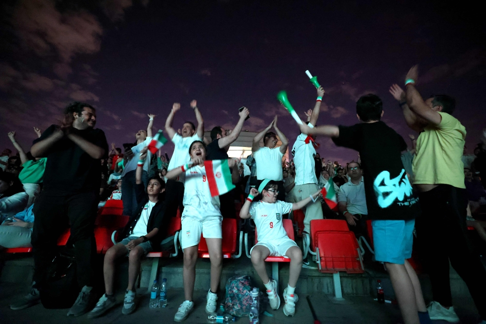 Iran divided over Team Melli as fans watch Belgium clash at home