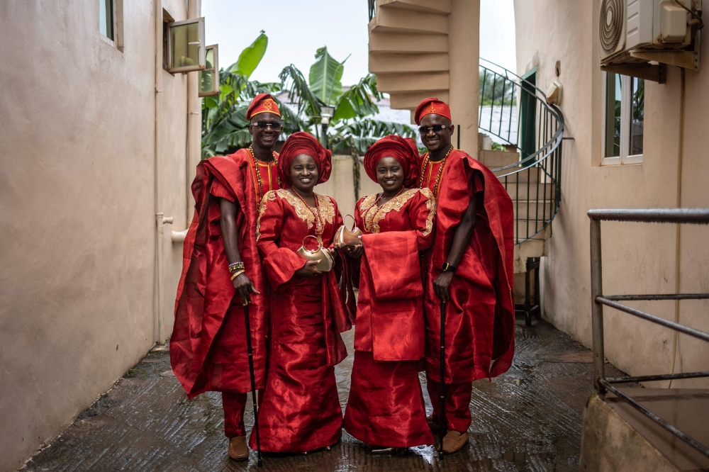 (From left) Kehinde Oguntoye, Kehinde Adediran, Taiwo Adediran and Taiwo Oguntoye pose for a photograph ahead of their traditional wedding ceremony in Lagos June 19, 2026. — AFP pic