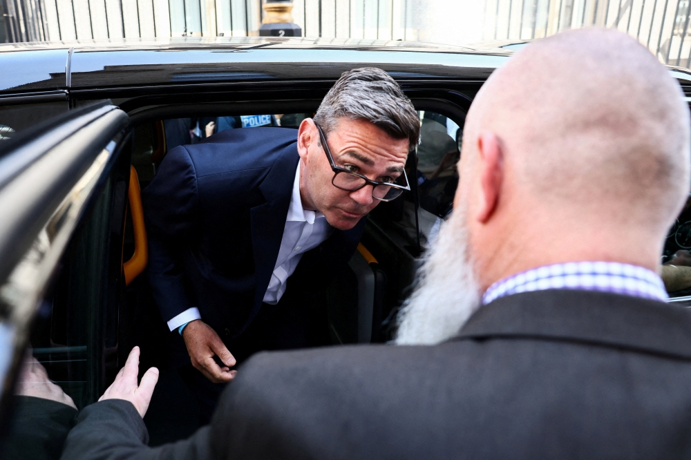 Newly elected Makerfield Member of Parliament and former Greater Manchester Mayor Andy Burnham arrives at Derby Gate by the Houses of Parliament in London, Britain on June 22, 2026, following Prime Minister Keir Starmer’s announcement of the timeline for his resignation. — Reuters pic