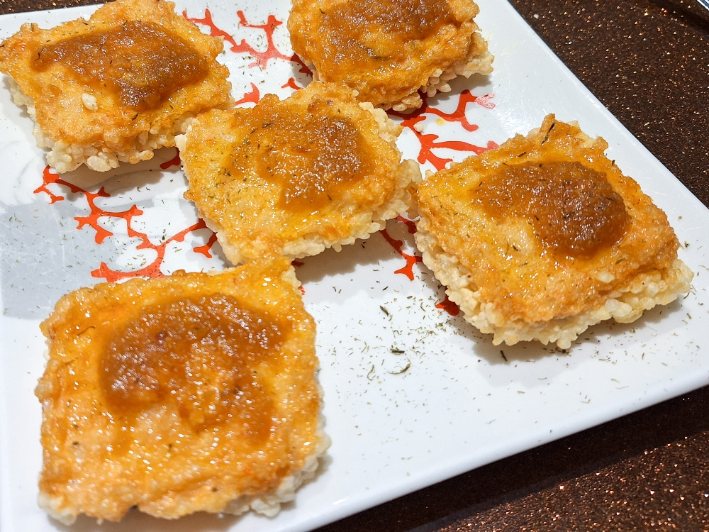 While white bread is commonly deep fried for the base of this dish, Ip used rice crust for a crispier and less oily bite, as bread tends to soak up oil. — Picture by Ida Lim 