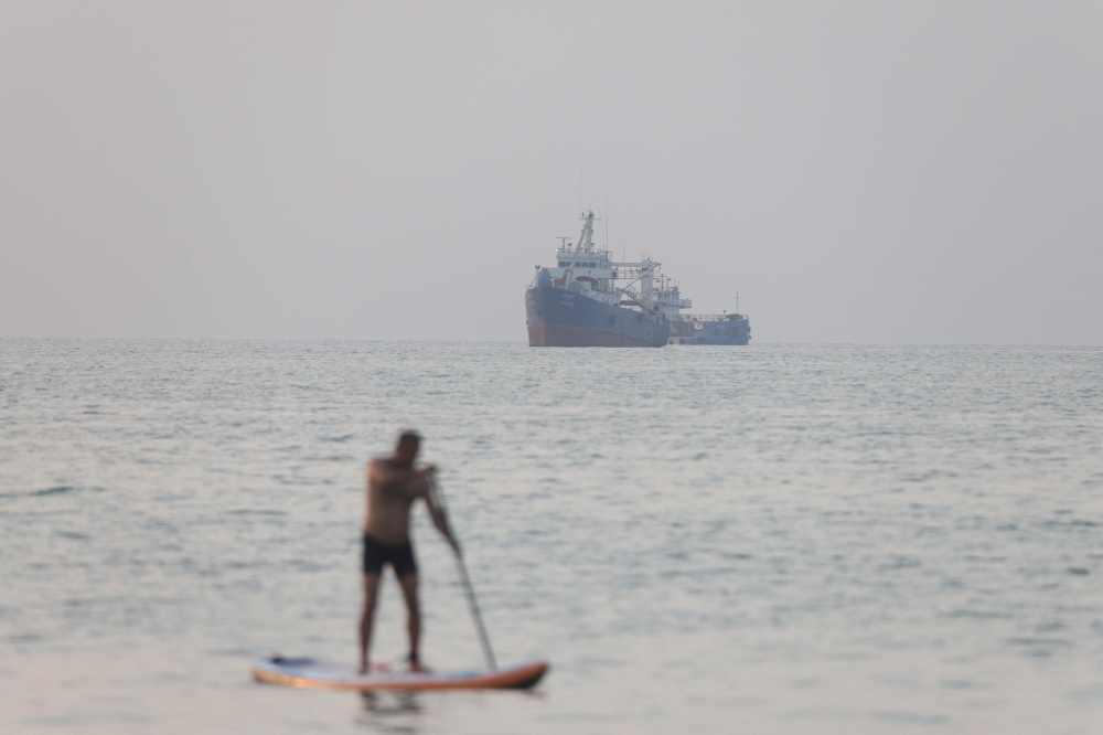 Iran says ships crossing Hormuz without approval ‘will be dealt with’