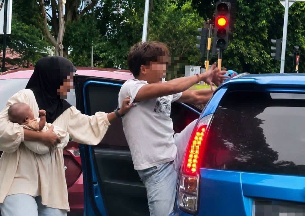 Road rage driver filmed attacking motorist in Melaka walks away after both sides make peace