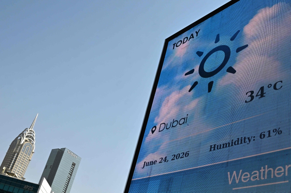 A video wall shows weather parameters in Dubai on June 24, 2026 with the temperature read 34°Celsius and 61 per cent humidity, in Dubai on June 24, 2026. — AFP pic