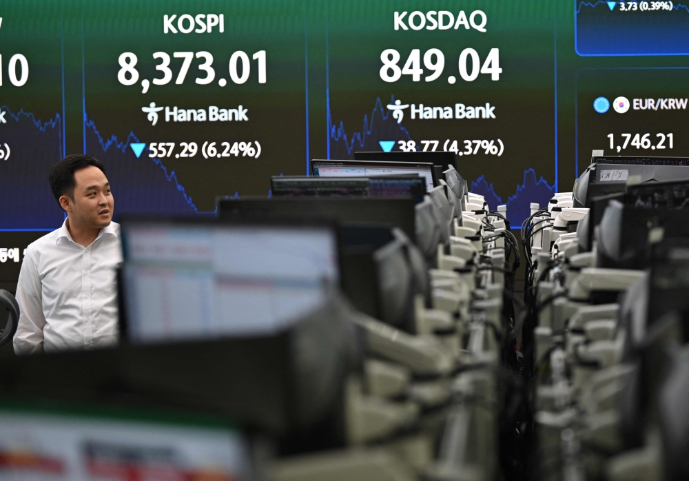 Asian markets sink again as AI tech sell-off deepens and global stocks slide