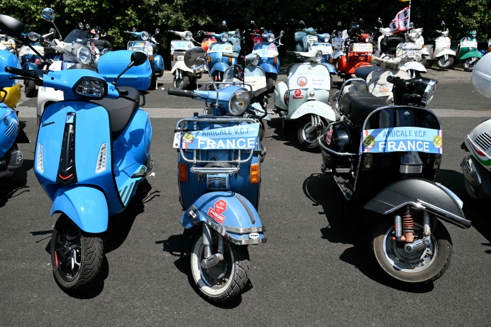 Vespa enthusiasts from around the world gather at the Vespa Village in Rome during the Vespa World Days to mark the 80th anniversary of the iconic Italian scooter brand on June 25, 2026. — AFP pic