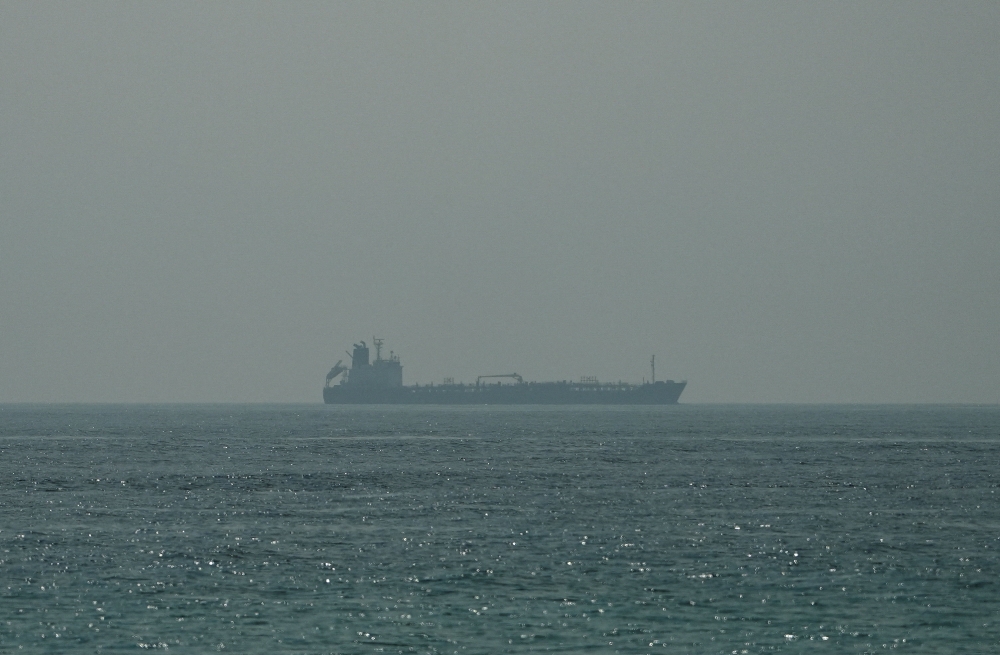 An oil tanker sails off the Omani coast, viewed from Musandam, Oman, June 26, 2026. — Reuters pic