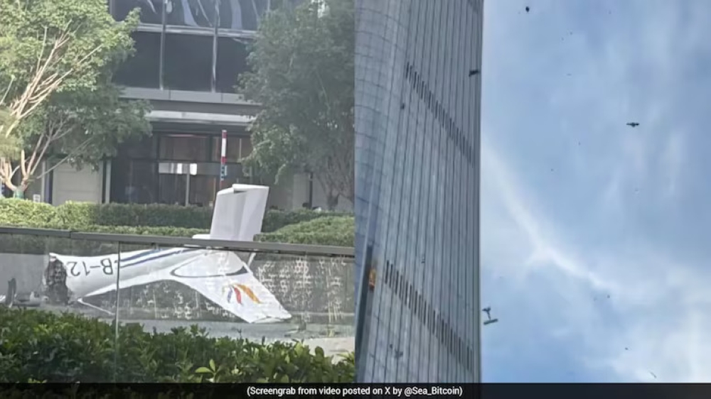 Pilot killed after small aircraft crashes into Beijing’s tallest building, 13 injured