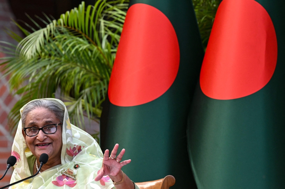 Bangladesh’s ex-PM Sheikh Hasina vows to return despite death sentence