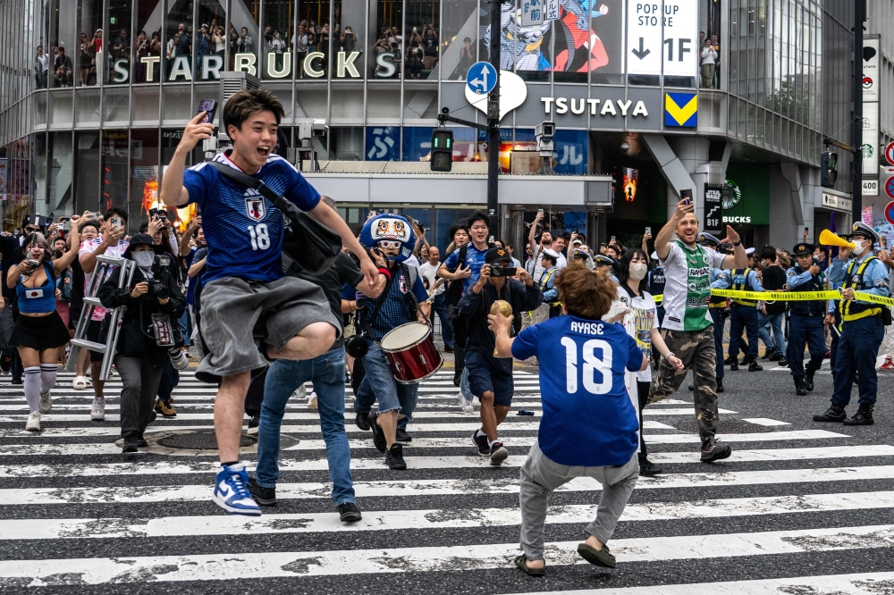 Japan’s supporters react after the 2026 World Cup Group F football match between Japan and Sweden in Shibuya, Tokyo on June 26, 2026. — AFP pic