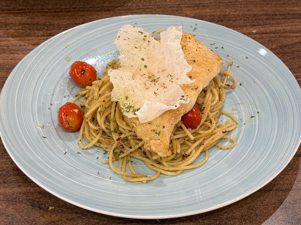 New Zealand sea perch is used for the fried fish paired with a herbed spaghetti in one of their set meals — Picture by Lee Khang Yi
