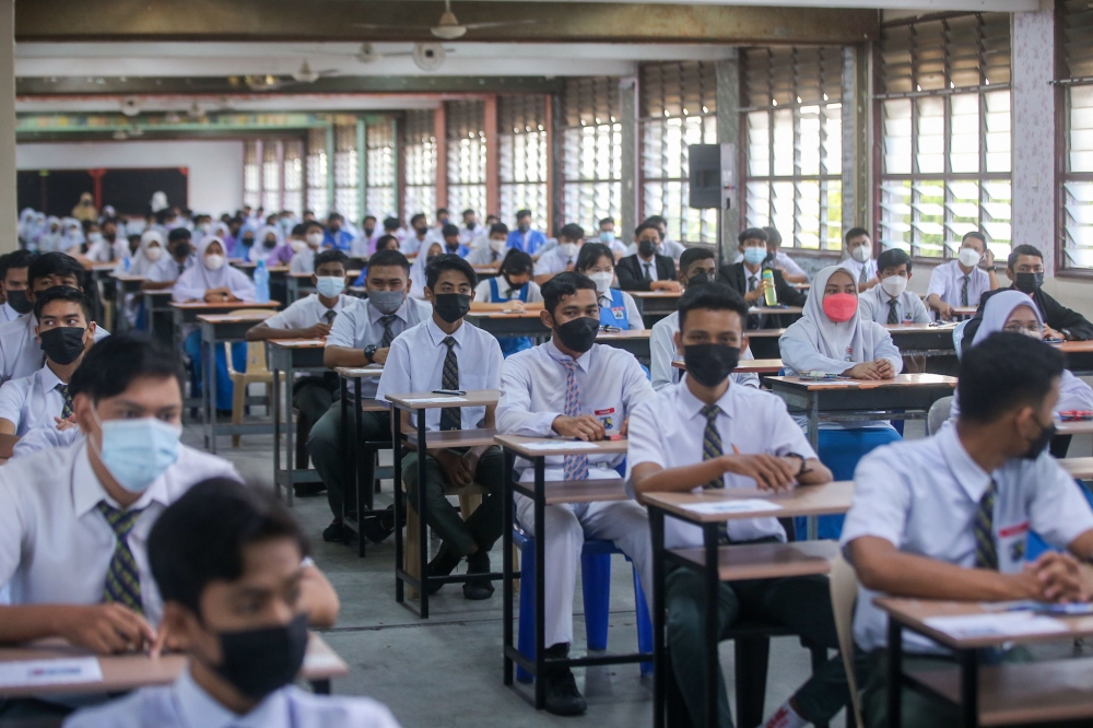 For many of us, success in school often meant remembering as much information as possible. We revised, completed exercise after exercise, and hoped that the examination questions resembled those in the workbook. — Picture by Farhan Najib