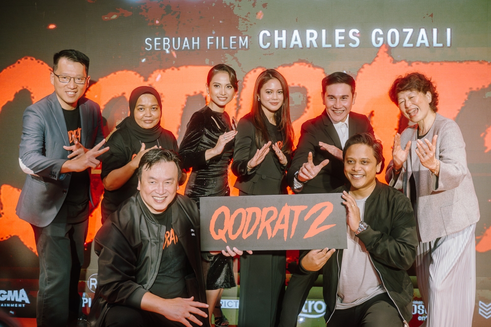 The cast and crew of ‘Qodrat 2’ pose at the film’s Malaysian gala premiere at Suria KLCC last year. — Picture by Raymond Manuel