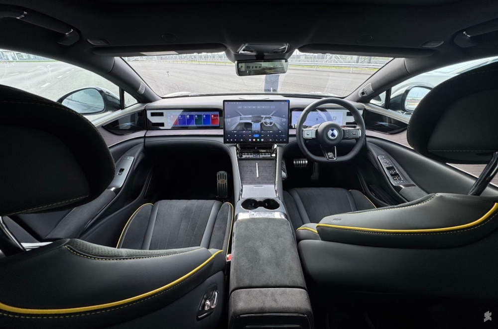 The Denza Z9 GT’s cabin features three dashboard displays, a 20-speaker Devialet audio system, massage seats for all four occupants and a built-in refrigerator. — Picture courtesy of Denza Malaysia