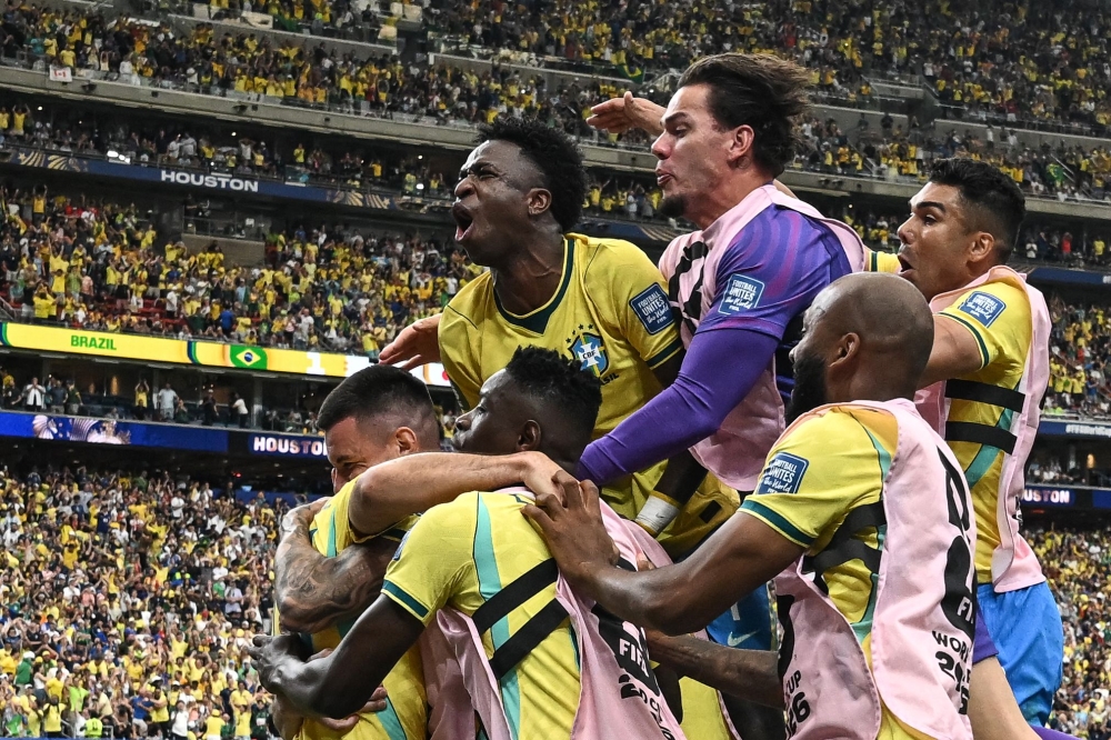 Brazil’s players celebrate their second goal during the 2026 World Cup round of 32 football match between Brazil and Japan in Houston June 29, 2026. — AFP pic