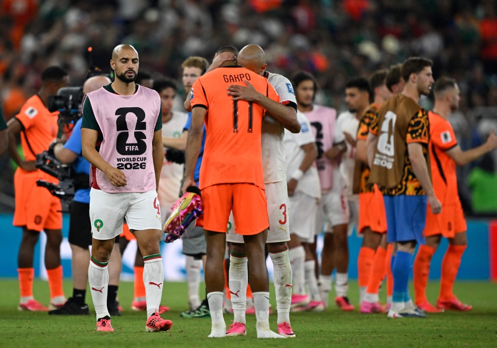 Netherlands forward Cody Gakpo is consoled by Morocco defender Noussair Mazraoui after the Netherlands lost the penalty shootout in their 2026 World Cup round of 32 match at Monterrey Stadium in Guadalupe, Mexico, June 29, 2026. — AFP pic