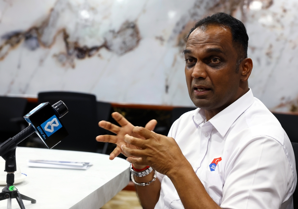 Johor polls: BN's Pannir Selvam banks on 'pocket talks' to win Perling