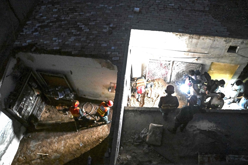 Roof collapse at Pakistan tutoring centre kills 14 children, injures five
