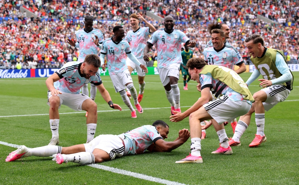 Belgium fights back from two goals down against Senegal to reach World Cup last 16
