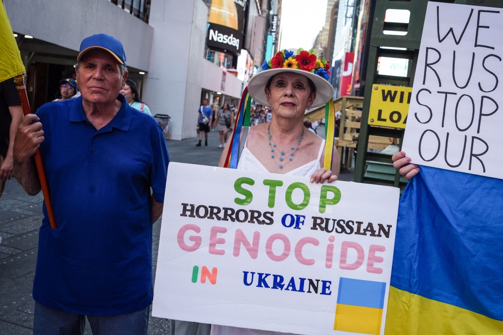 Demonstrators march in support of Ukraine in Times Square, New York on July 2, 2026. — AFP pic