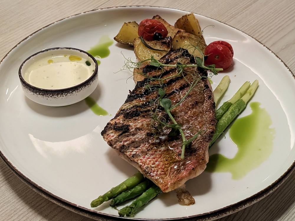 A simple snapper dish became the platform for a story of redemption during my dinner at Bacio. — Picture by Ethan Lau 