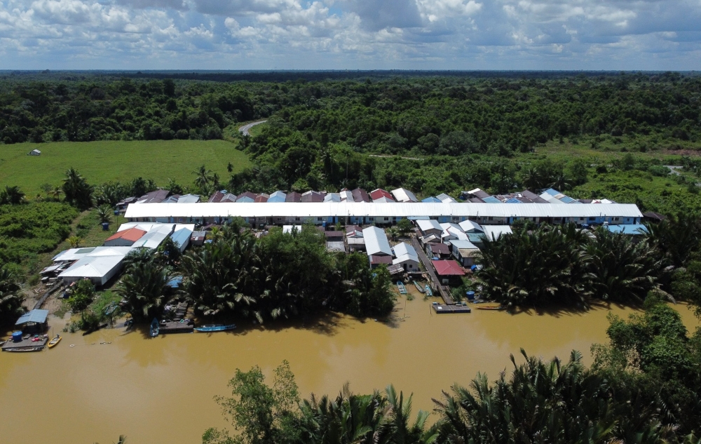 A bird’s eye view of Rumah Haliah on the banks of Sungai Semah. — The Borneo Post pic