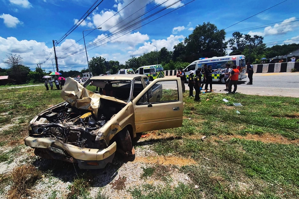 Thai Buddhist procession death toll rises to 10 after boy, 11, drove pickup into monks