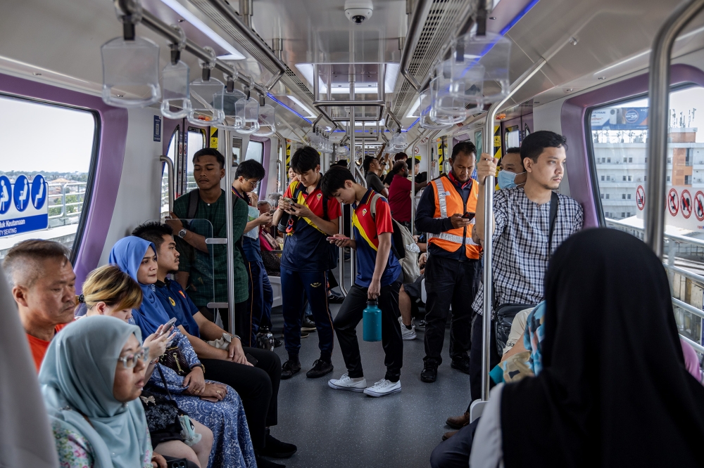 Inside the LRT3 Shah Alam line. — Picture by Firdaus Latif