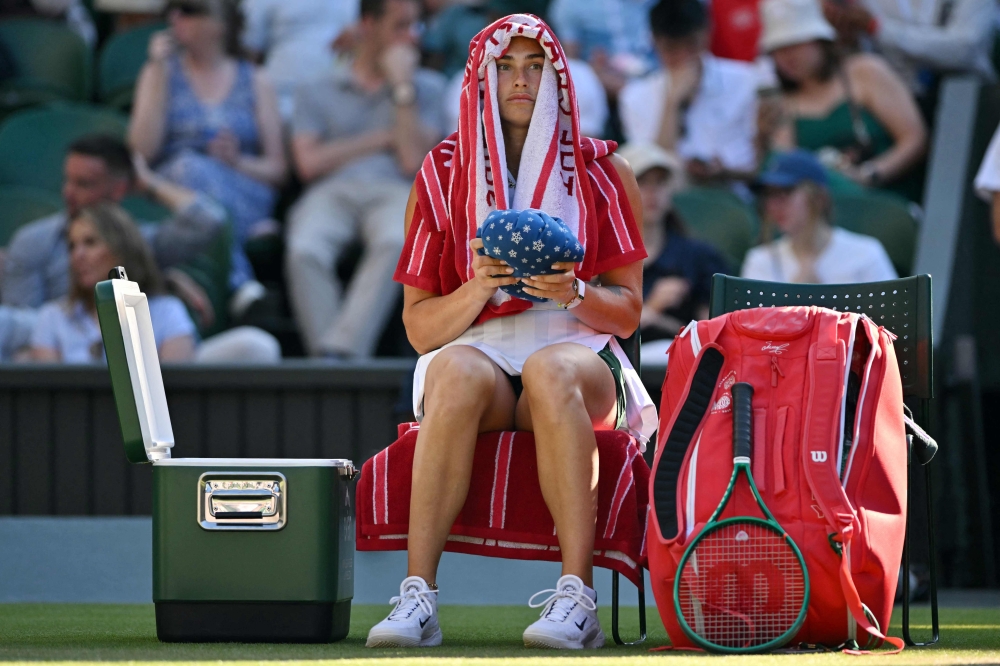 Game recognises game: Wimbledon players, fans sneak in World Cup action despite screen ban