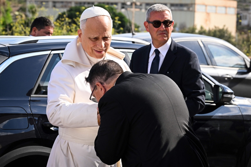 Pope defends migrants at Mediterranean island frontier