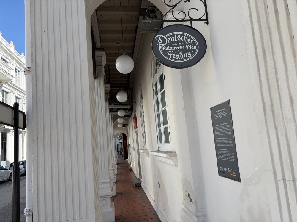 The German heritage trail in George Town is marked by these signs with information on the buildings. Shown here is the Bank of China building in Beach Street. 