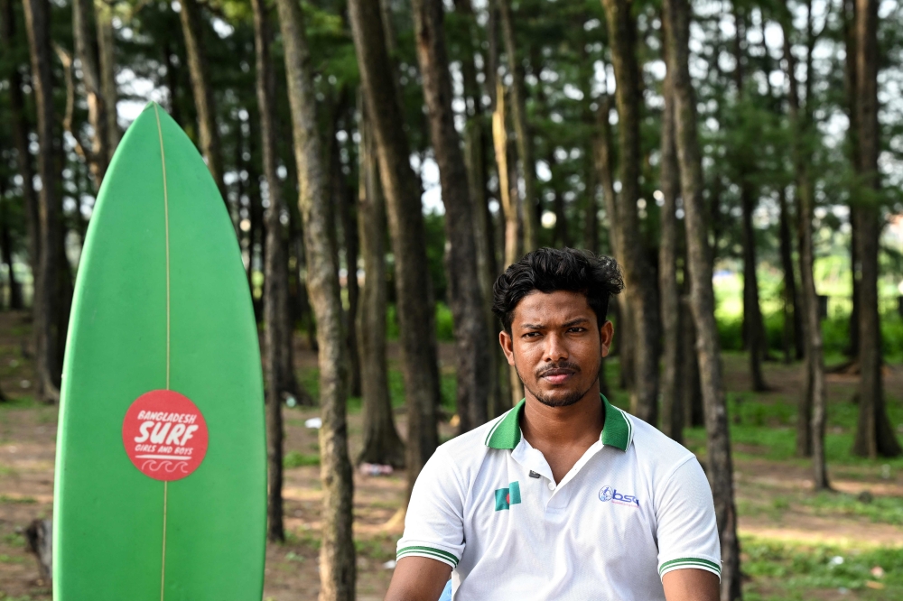 Mannan hopes his Asian Games debut will prove that surfing has a future in Bangladesh. — AFP pic