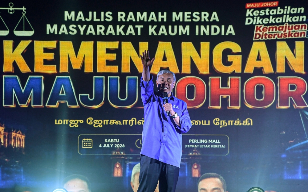 Deputy Prime Minister and Barisan Nasional chairman Datuk Seri Dr Ahmad Zahid Hamidi delivers a speech during a gathering with the Indian community at Perling Mall in Johor Bahru on July 2, 2026. — Bernama pic