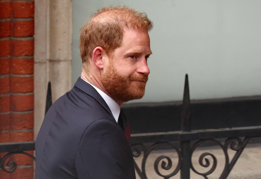 Prince Harry arrives in UK as trip clouded by palace snub, looming tabloid ruling and family’s absence over security