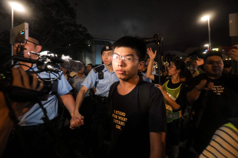 Hong Kong to sentence activist Joshua Wong in September
