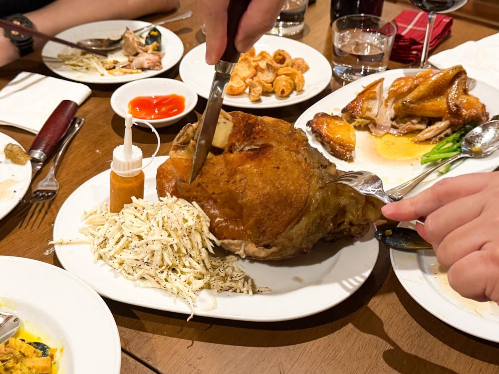 Crispy Pork Knuckle is a showstopper dish with that golden crispy skin and juicy meat. — Picture by Lee Khang Yi