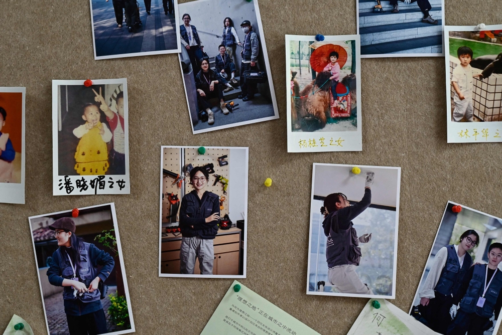 Photographs are displayed on a board at the Mulan Build workshop in Hangzhou, in eastern China’s Zhejiang province on June 28, 2026. — AFP pic