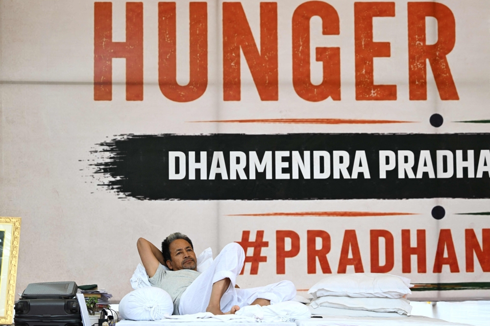 Climate activist Sonam Wangchuk gestures during his indefinite hunger strike at Jantar Mantar in New Delhi on July 7, 2026. — AFP pic