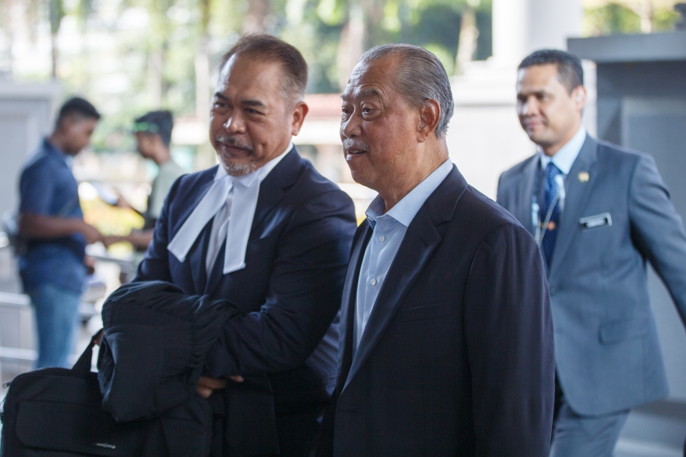 Former prime minister Tan Sri Muhyiddin Yassin arrives at the Kuala Lumpur High Court Complex for his ongoing trial July 7, 2026. — Picture by Raymond Manuel